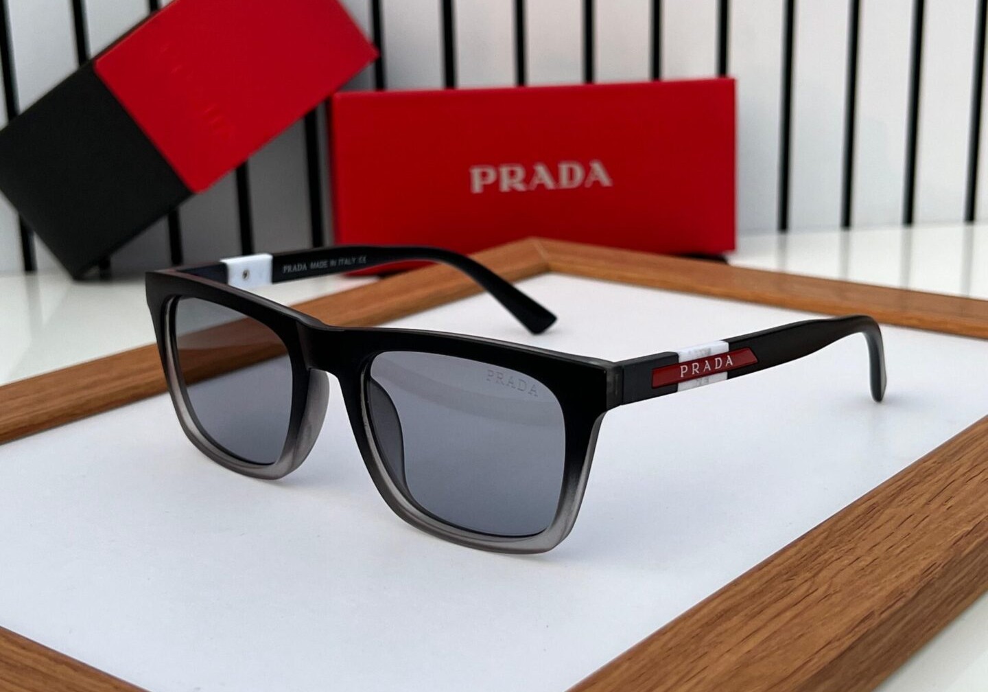  Italian designer sunglasses by Prada in Kannur