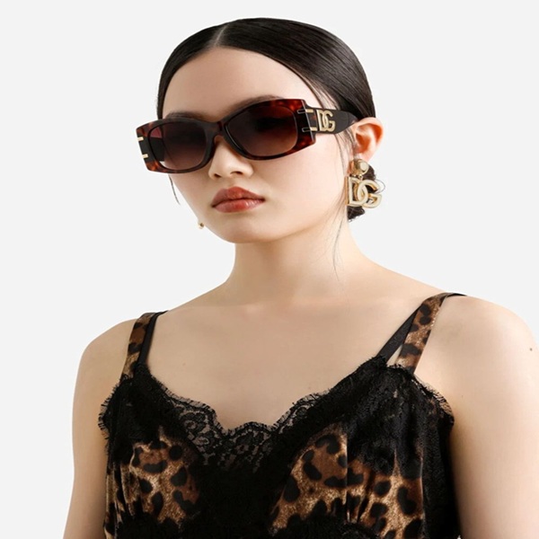 Stylish D&G sunglasses on shelf at Kerala optical store